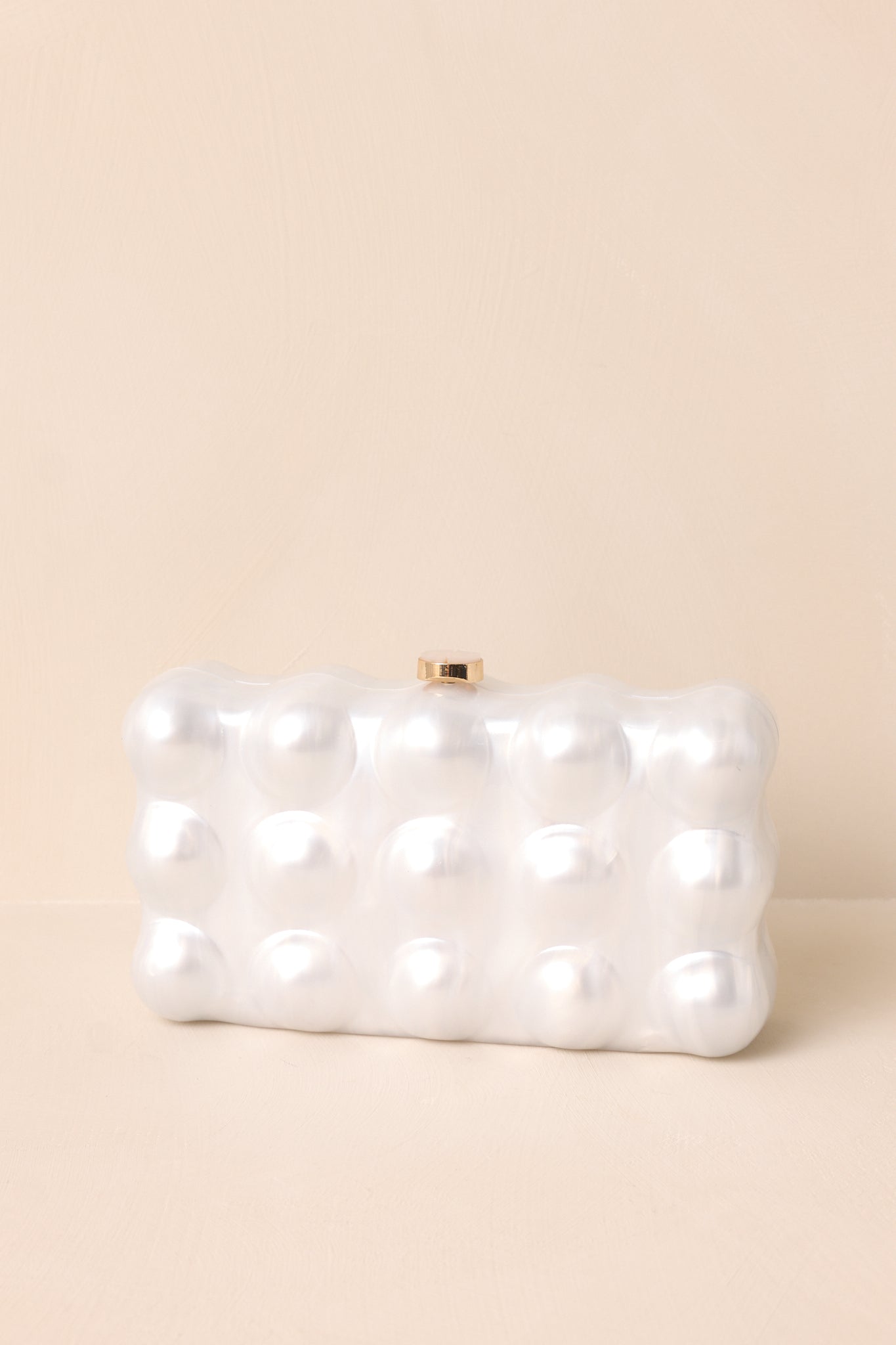Eclipse’s Whisper Ivory Pearlescent Clutch