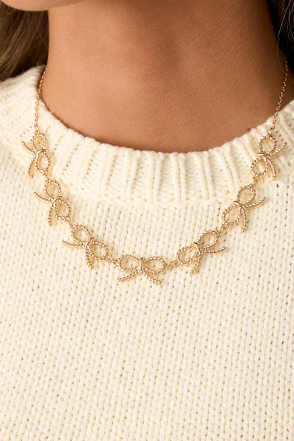 Know The Feeling Gold Bow Necklace