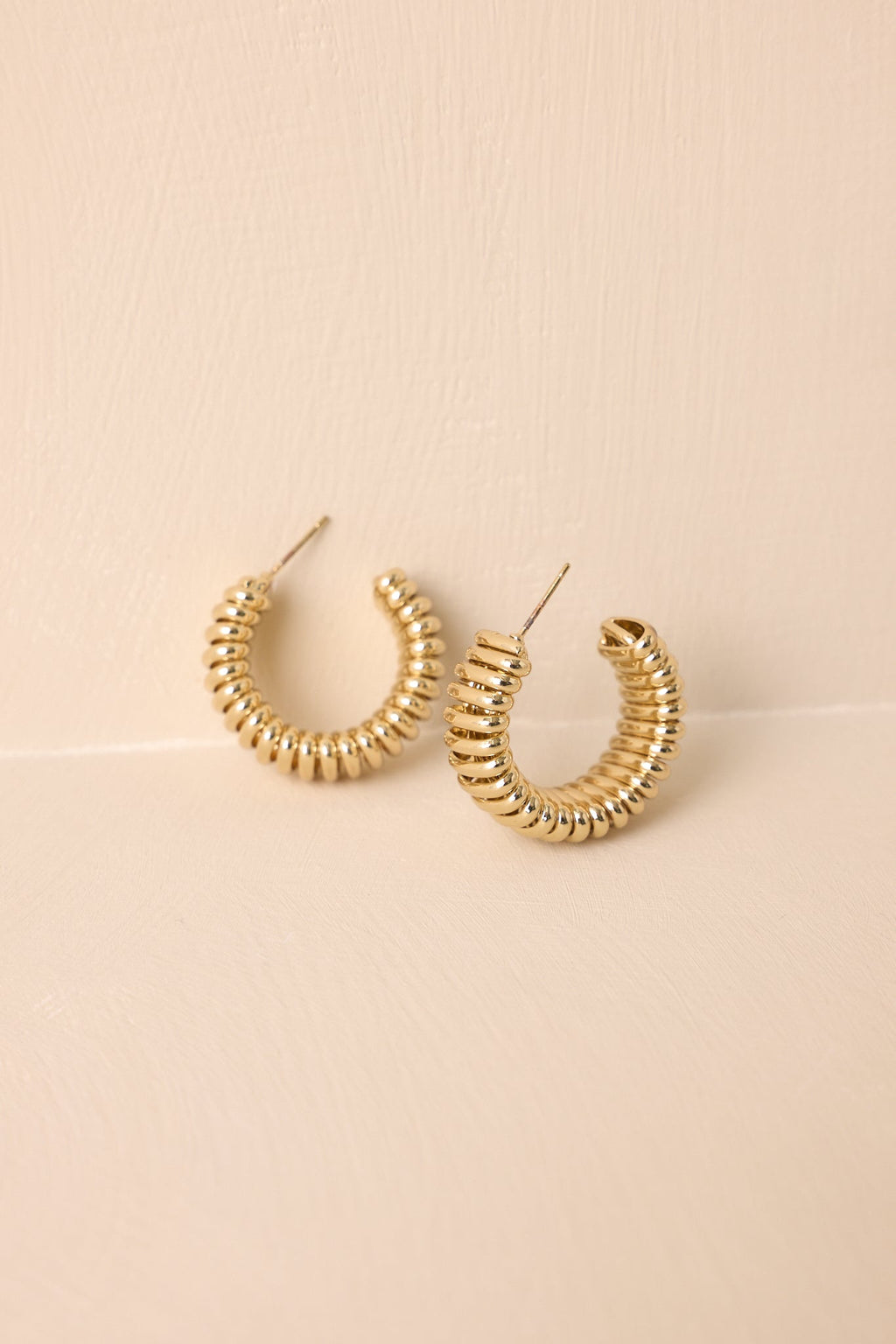 Catch Me If You Can Ribbed Gold Hoop Earrings