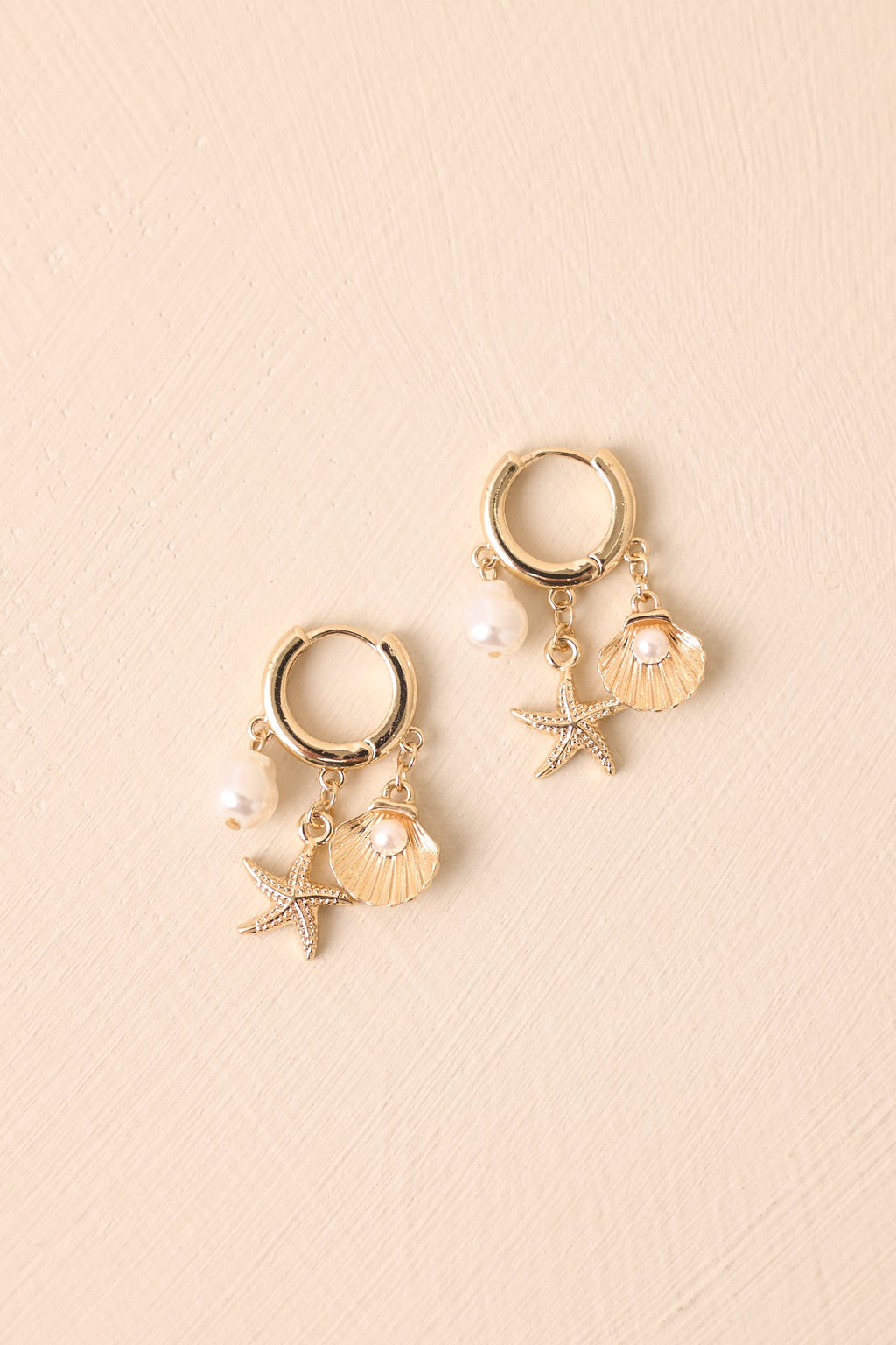 Go With The Waves Gold Huggie Beach Charm Earrings