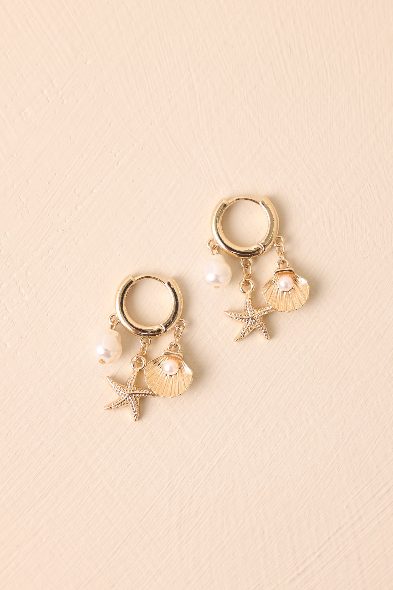 Go With The Waves Gold Huggie Beach Charm Earrings
