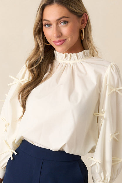 Drifting Currents Ivory Bow Blouse