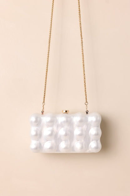 Eclipse’s Whisper Ivory Pearlescent Clutch