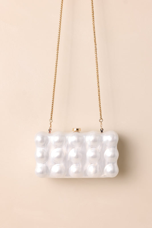 Eclipse’s Whisper Ivory Pearlescent Clutch