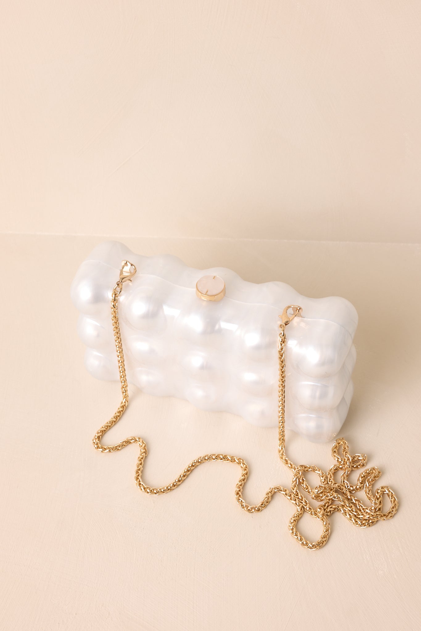 Eclipse’s Whisper Ivory Pearlescent Clutch