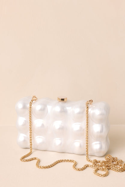 Eclipse’s Whisper Ivory Pearlescent Clutch